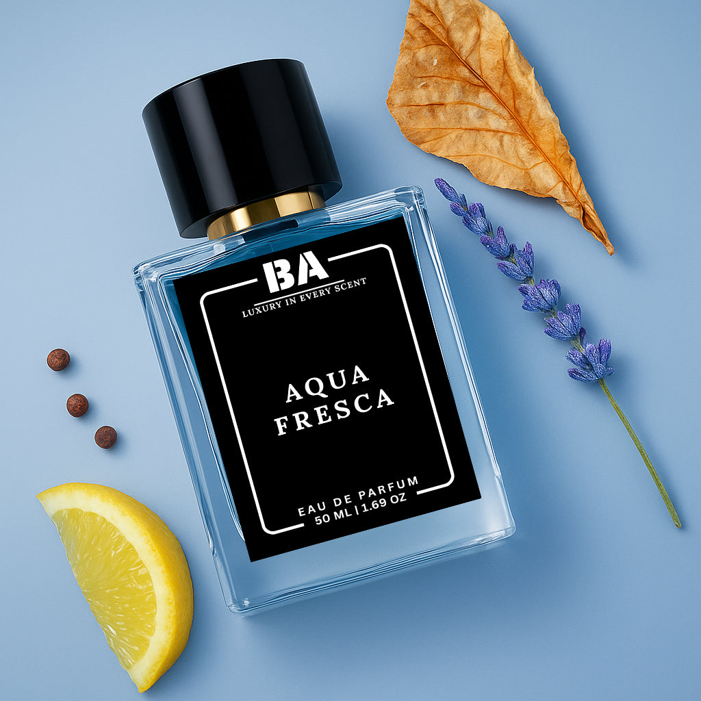 Bella Aroma Aqua Fresca Eau de Parfum bottle with lemon, lavender, and dried leaf on blue background